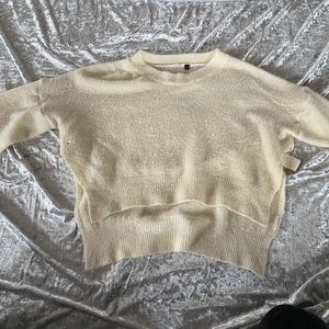 Split sides off white sweater